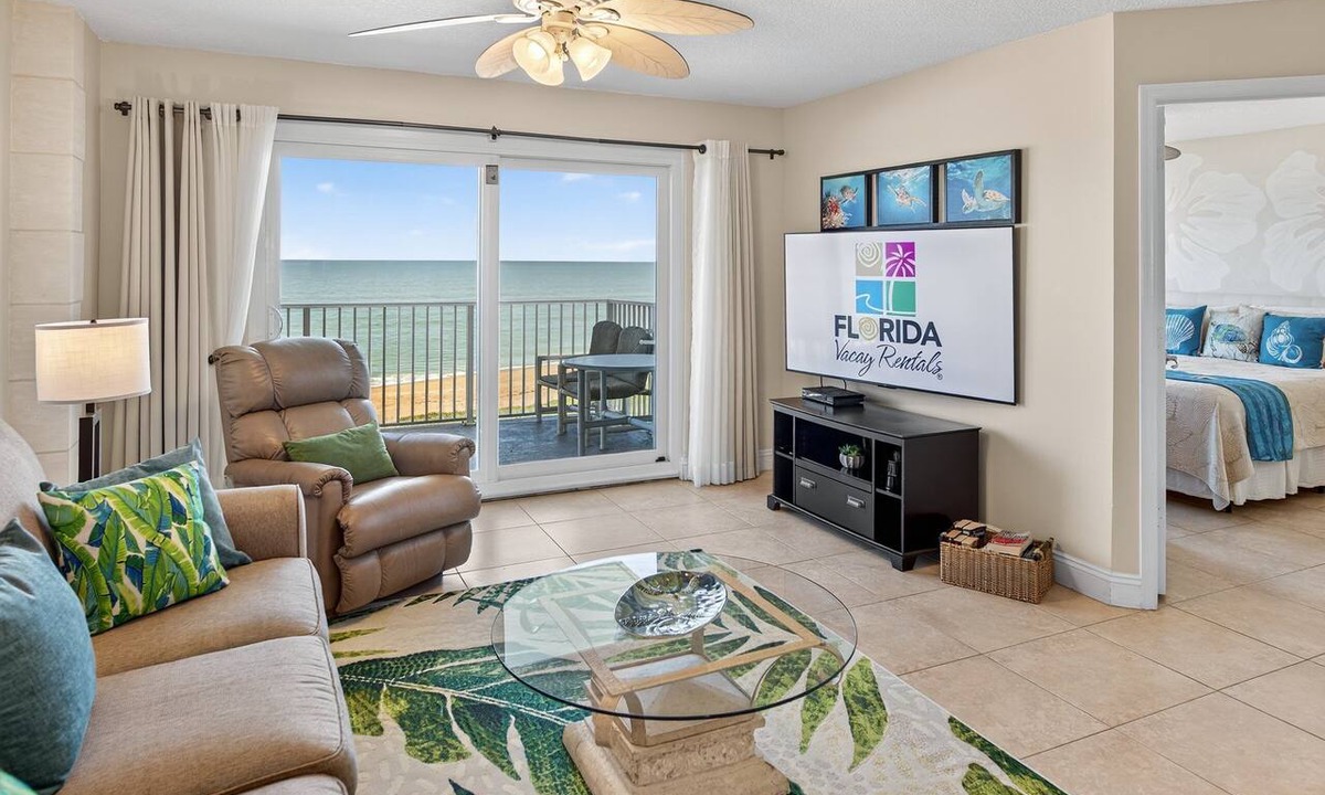 Seawinds Condo Condo | Direct oceanfront 2/2 condo with a private balcony, heated beachfront pool, and garage