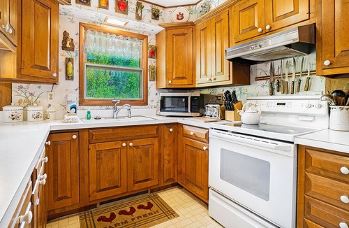 Thompsonville House | Charming riverfront home with fireplace & firepit - dog-friendly, skiing nearby