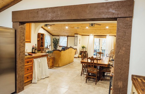 Dahlonega House | Villa Serena Tuscan Theme home with a HIDDEN lounge, fire pit, lawn games, creek
