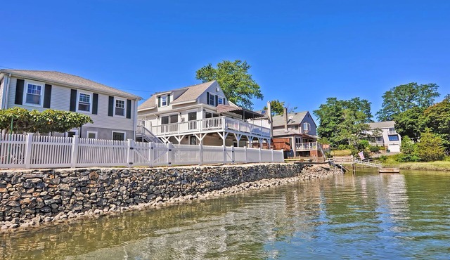 Afternoon Delight: Toast the beauty of the river from the waterfront deck