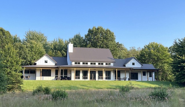 Beautiful new house nestled in a private and fenced 30 acres nature sanctuary.