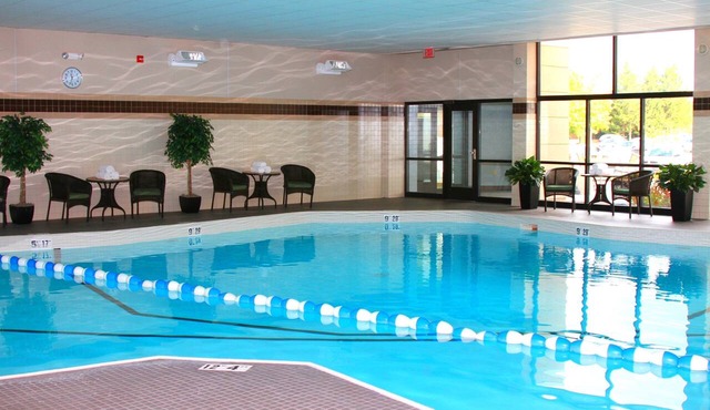 Comfortable Suite Near Hancock International Airport | Free Breakfast + Fitness Center