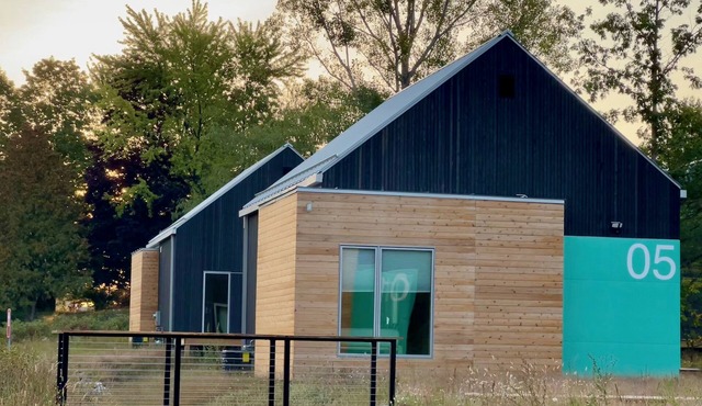 KOTI 5 (Two Bedroom) Traverse City's Scandinavian Cabins, vacation home on TART & mins to Traverse C.
