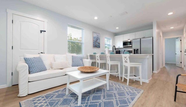 Peaceful coastal Condo - walk to the beach!