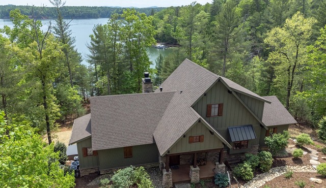The Waterman | Lakefront Luxury with Hot Tub & Dock!